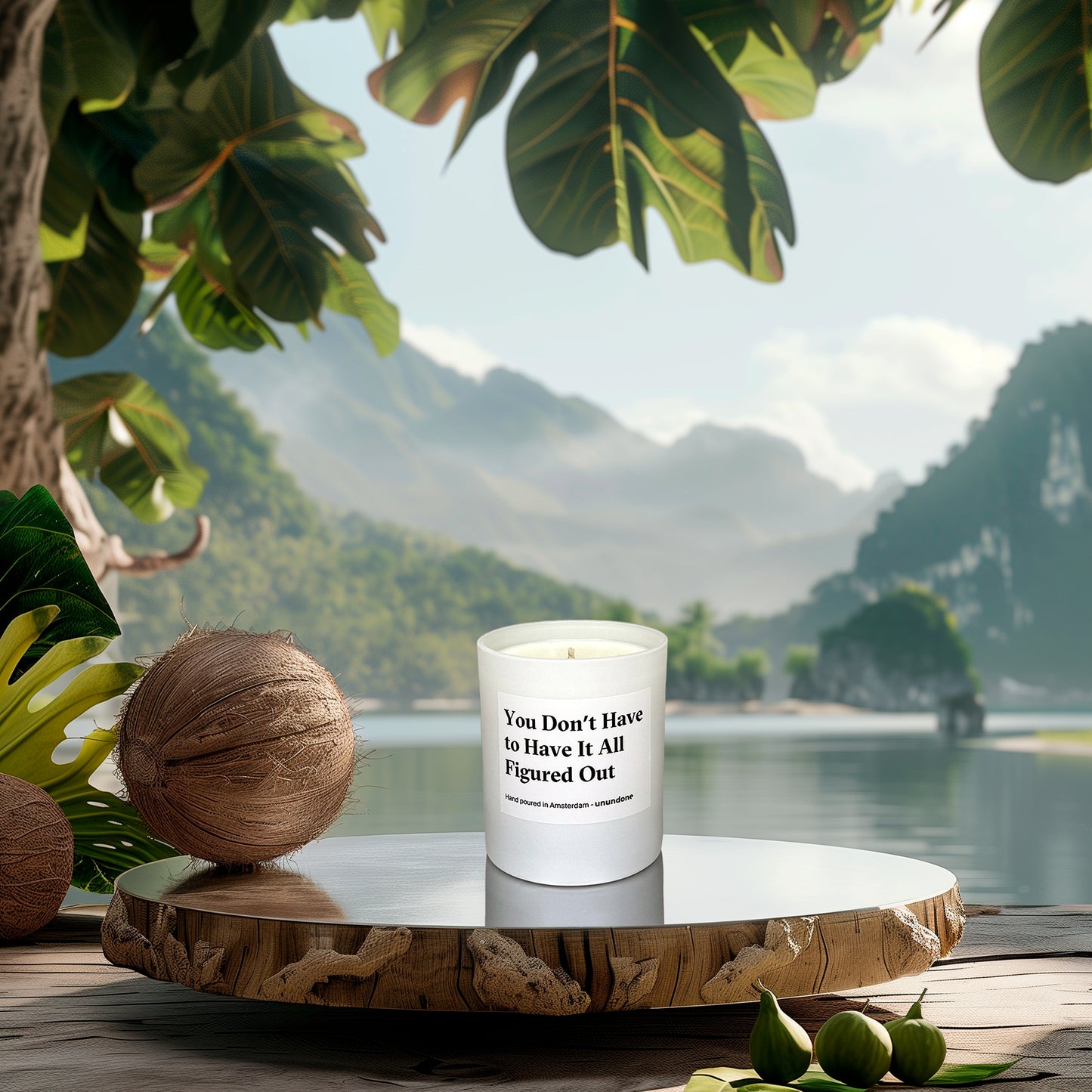 Mood image featuring Unundone’s ‘You Don’t Have to Have It All Figured Out’ candle surrounded by green figs, coconuts, and tropical scenery.